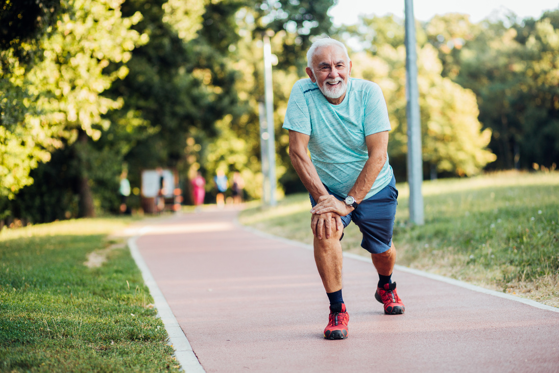 Older man exercising in the park